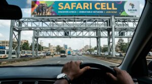 Gantry Billboard Advertising in Nigeria: Costs, Locations, and Strategy 1 A driver from inside a car looking forward through a gantry billboard frame