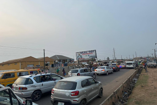 Double-Faced Billboard at Ogijo–Ikorodu Road Opposite St. John’s Primary School, Ogijo