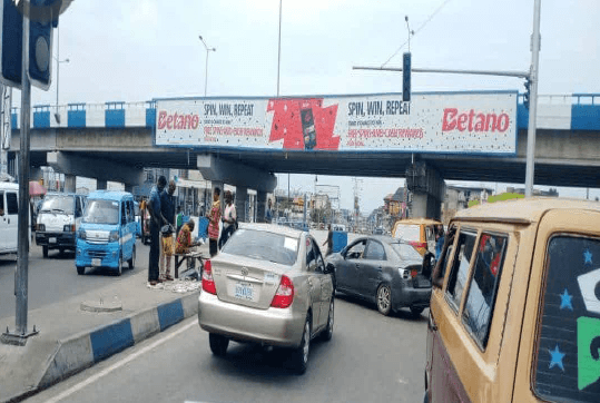 Gantry Billboard Along Ikwerre Road by Ikoku Spare Parts Market (FTF Mile 3 Market & Agip Flyover), Port Harcourt