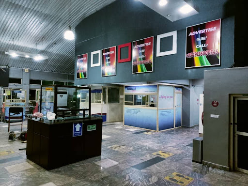 Static Wall-Mounted Billboard at Departure Ticketing Hall Information Desk