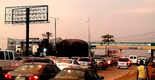 Billboard in Benin City, Benin-Lagos Road by University Pedestrian Bridge FTF Uselu Market