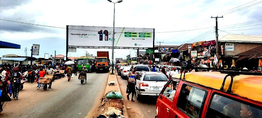 Billboard in Benin City, New Lagos Road by New Benin Market FTF Uselu Market