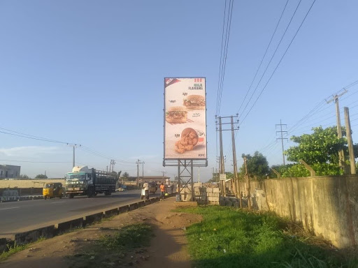 Billboard in Lagos, Ikorodu, Sagamu Road by Domino's and LASMA Office, opposite Igi-Aje Estate