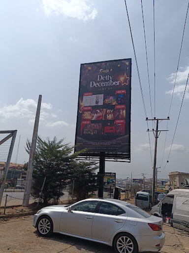 Billboard in Onitsha, Regina Junction by Enugu-Onitsha Expressway