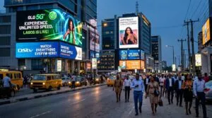 multiple large digital billboards (LED screens) displaying different ads