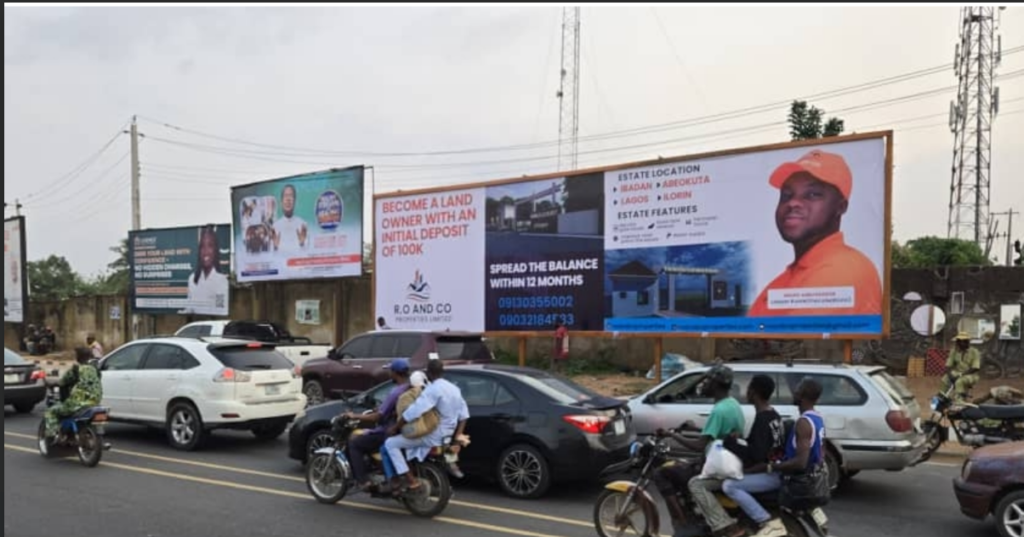 Billboard in Ibadan, Oyo State, at Civic Centre Idi Ape, facing Gate and Iwo Road