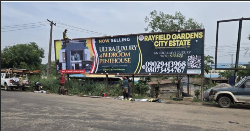 Billboard in Ibadan, Oyo State, at Methodist Toll Gate by Lead City, facing New Garage, Iwo Road Express and Lagos Express
