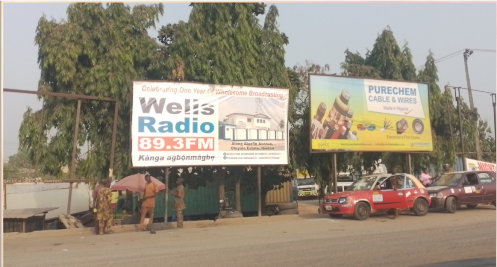 Billboard in Ibadan, Oyo State, at Methodist Toll Gate by Leadcity Junction, facing Ibadan Toll to Iwo Road