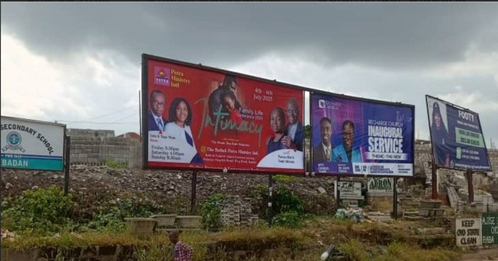 Billboard in Ibadan, Oyo State, at Mile 110 Roundabout, facing Ring Road, Apata and Aleshinloye