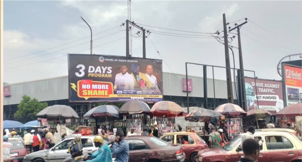Billboard in Ibadan, Oyo State, at Mokola Under Bridge opposite Wema Bank, facing Adamasingba, Uncle Joe and UCH Road