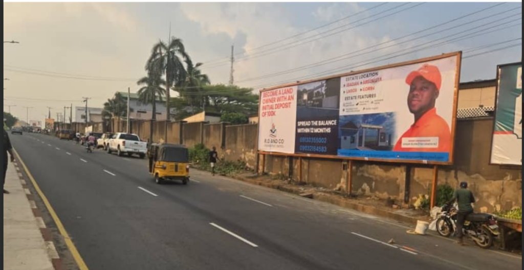 Billboard in Ibadan, Oyo State, at Oshuntokun Junction, Bodija, facing Secretariat and UI