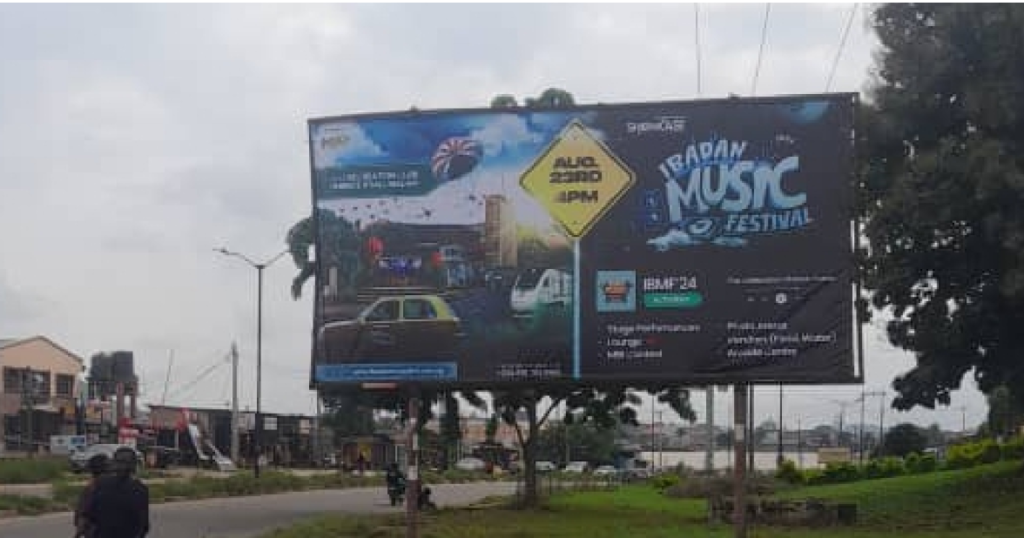 Billboard in Ibadan, Oyo State, opposite SEAP Microfinance Bank by Ibadan Polytechnic Fence, SangoEleyele Road, facing Sango and Eleyele
