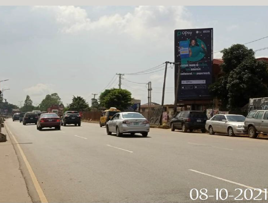 Portrait Billboard at Along Enugu Expressway, By God Great Ministry, Zik Roundabout, Onitsha, Anambra State