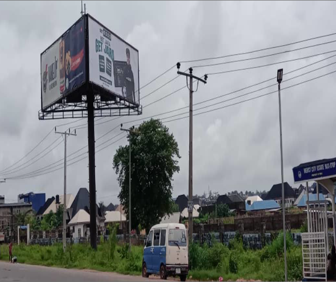 Portrait Billboard at Benin Asaba express way by Asaba Airport, Asaba, Delta State