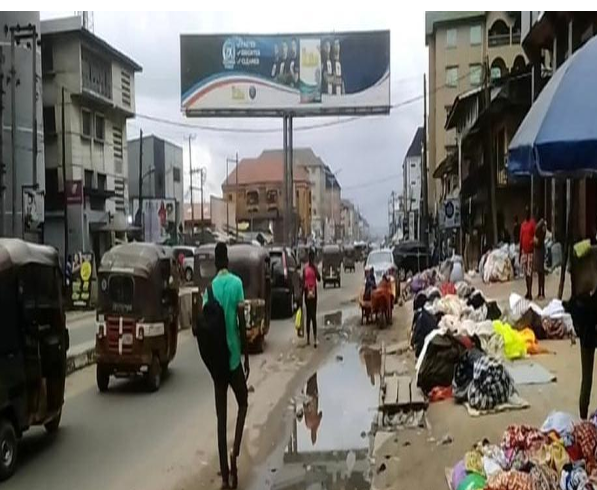 Unipole Billboard along Azikwe road by Wema Bank FTF Cemetery Market & Asa Road Market, Aba, Abia State