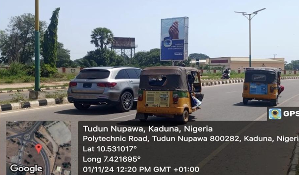 Portrait Billboard at Along Polytechnic Road, Kaduna, FTT Kasuwan Bechi Market, Kaduna State