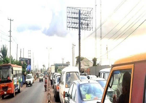 Unipole Billboard at Sapele road after Market Square shopping mall by former Coca cola Depot Fence, Benin City, Edo State