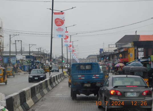 Lamp Pole Advertising along Ago Palace Way Okota, Okota, Lagos State