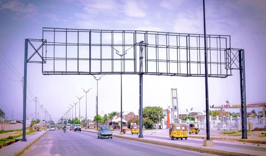 Gantry Billboard along BUK Road After AGYL Petrol Station, Kano, Kano State